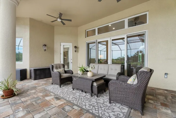 Back downstairs on the pool deck you'll find two separate lounges.  This one is off the living room and primary suite