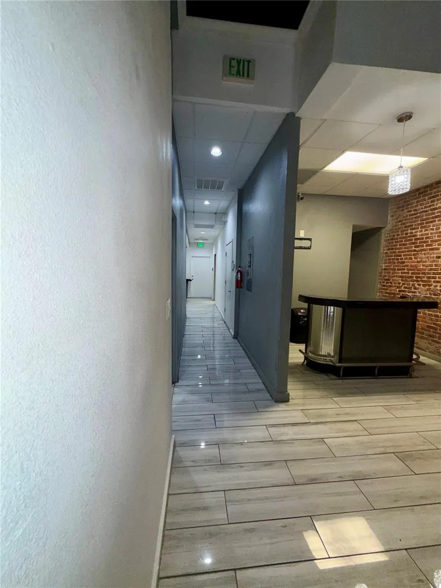 hall looking back to office and rear entry door
