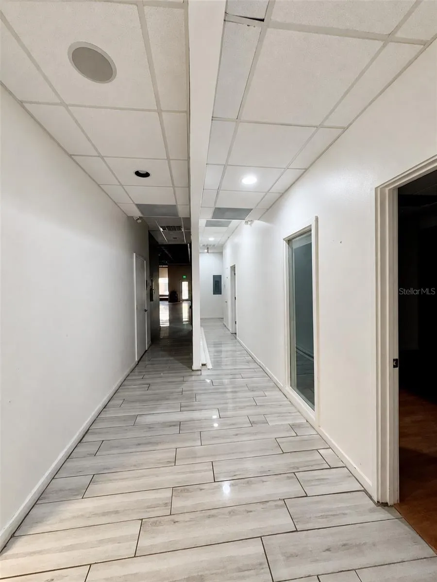 hall to offices, kitchen and front entry