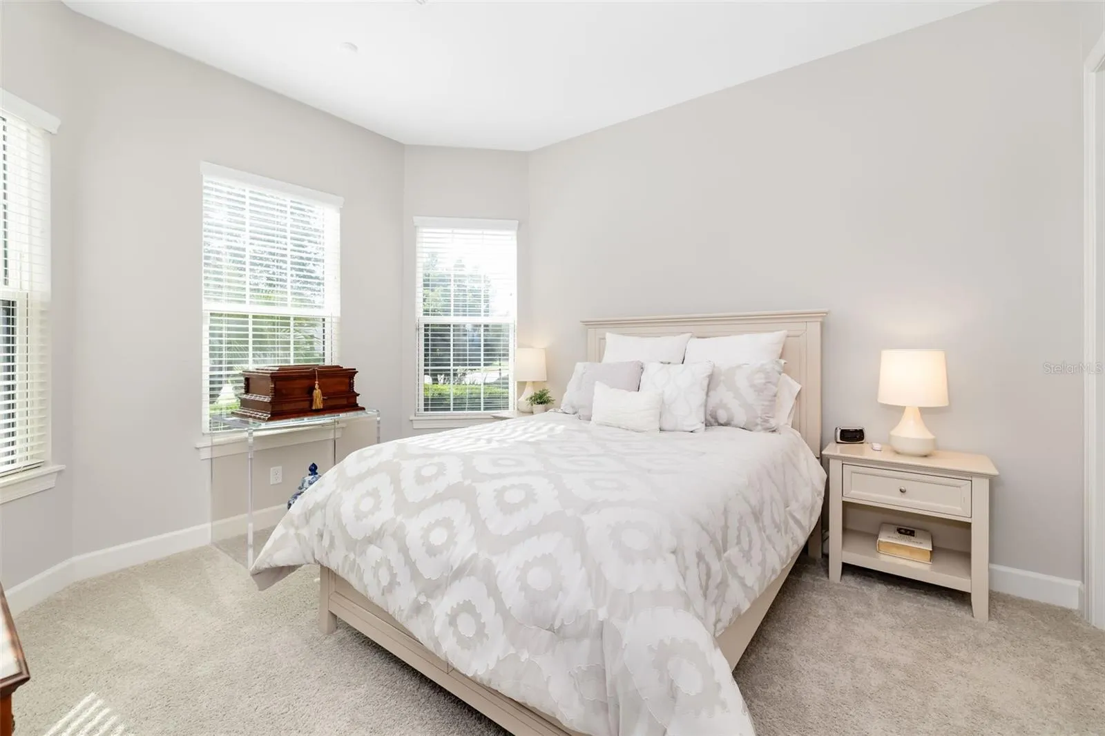 The second ensuite bedroom, in the front of the home, offers ta offers a three window bay and a full bath with a tub/shower combination.