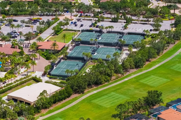 Near the Wellness Center is the Tennis Center with 6 har-tru courts and a great pro!