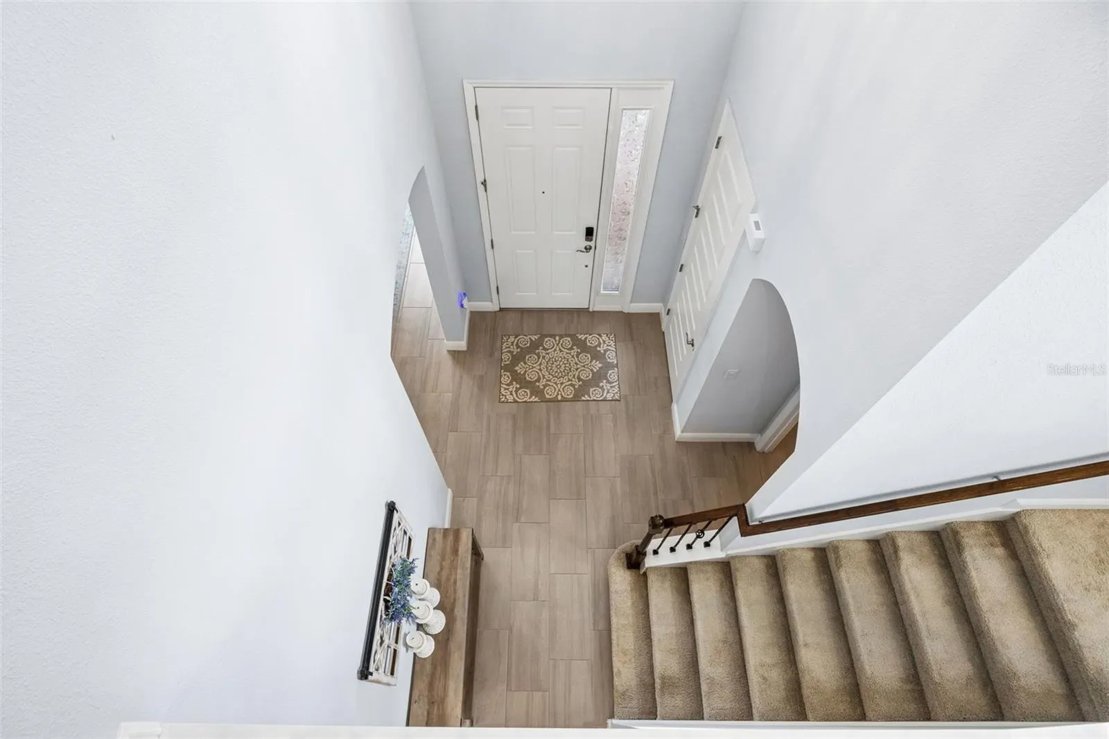 Two story Foyer - Stairs with Wrought Inron Railing