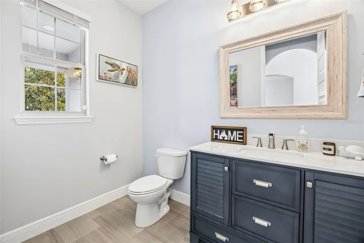 Remodeled Powder Bath with Upgraded Cabinet &amp; Mirror