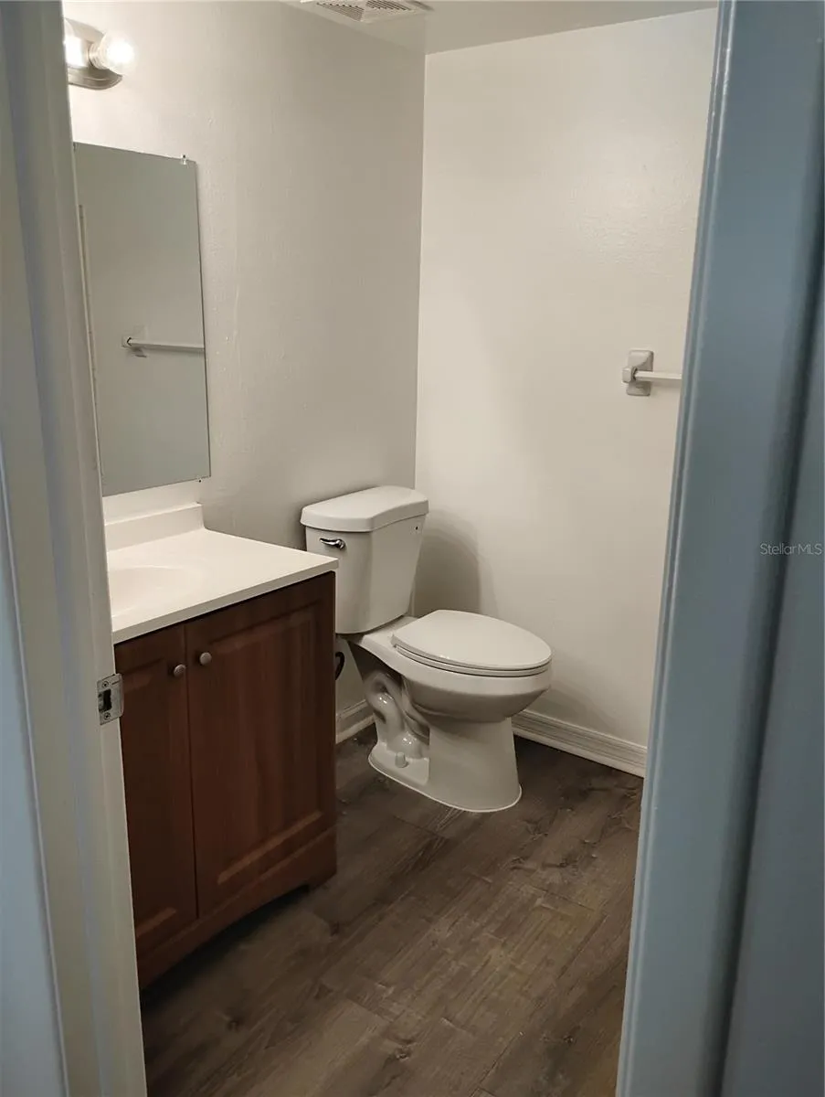Bathroom entrance view. Bathtub and shower. available.