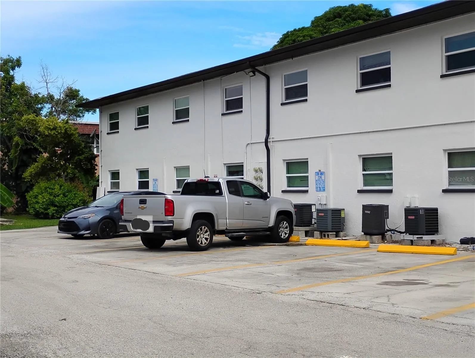 Parking lot in rear.