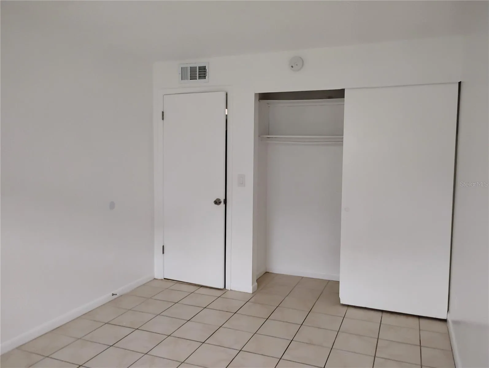 Bedroom 2 Closet and door.
