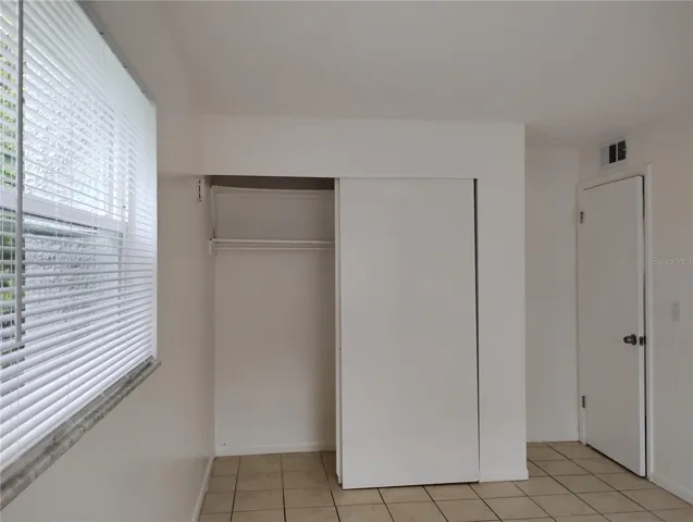 Bedroom 1 closet and entrance.