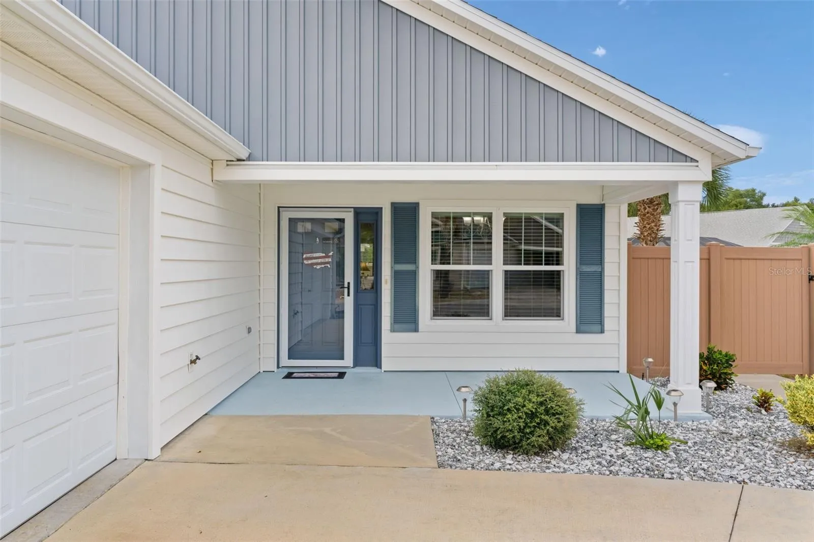 The front glass storm door welcomes you into a bright &amp; sunny, open floor plan.