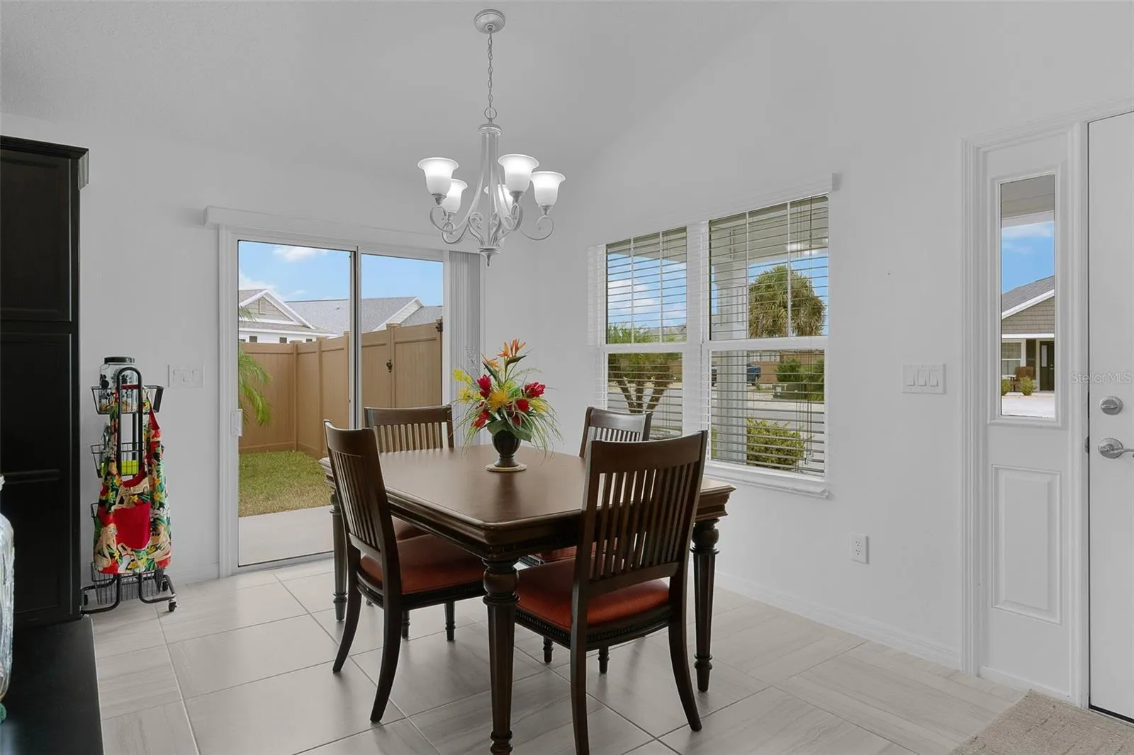 The dining room has a slider to the side patio -- perfect for grilling!