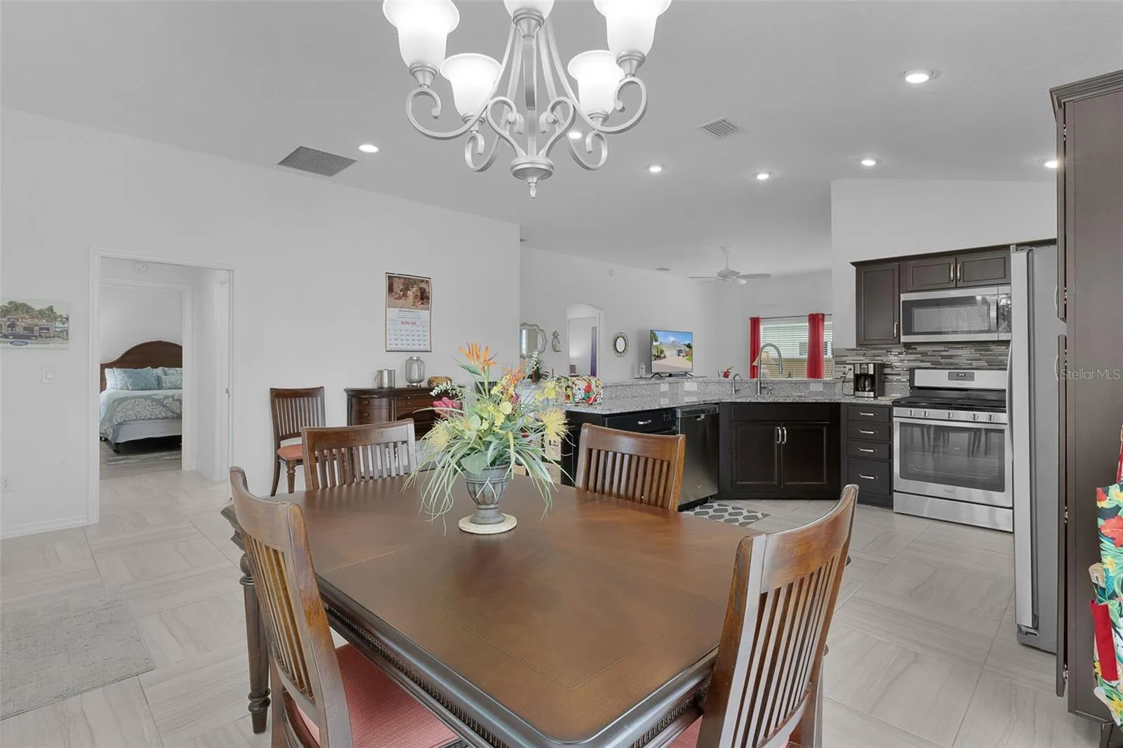 Open floor plan with volume ceilings.