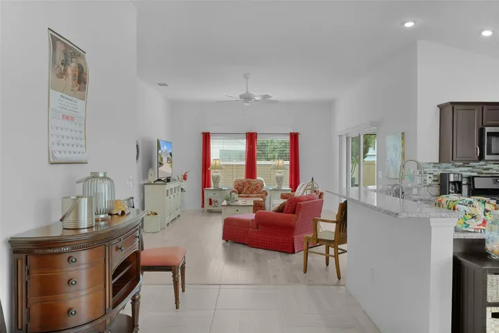 There's a breakfast bar with granite countertops