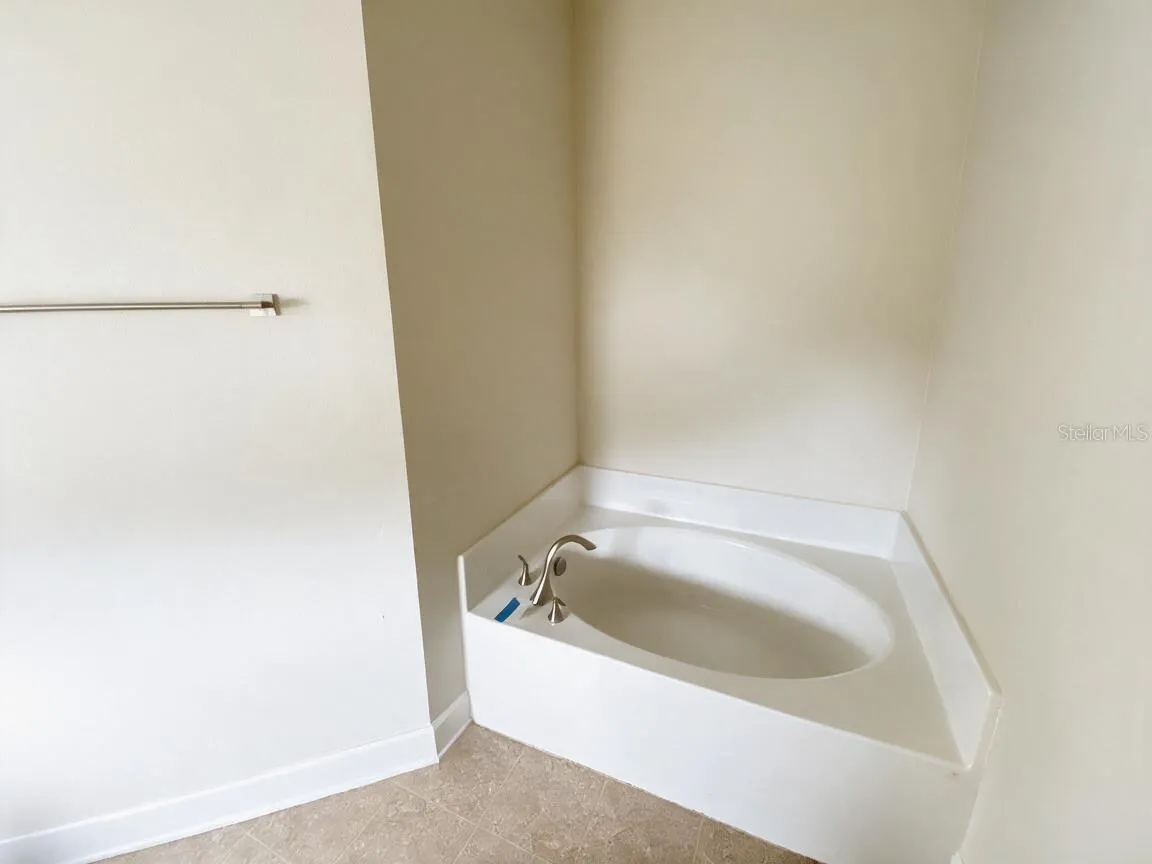 Primary En-suite with Double Sink, Shower and Soaking Tub.