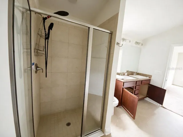 Primary En-suite with Double Sink, Shower and Soaking Tub.