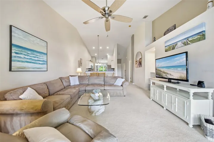 Living area with vaulted ceilings