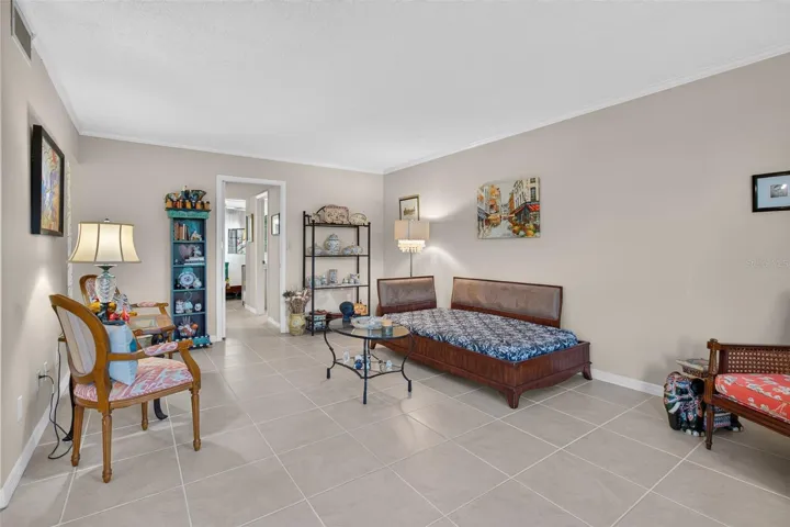 Living room with doorway to ensuite bedroom