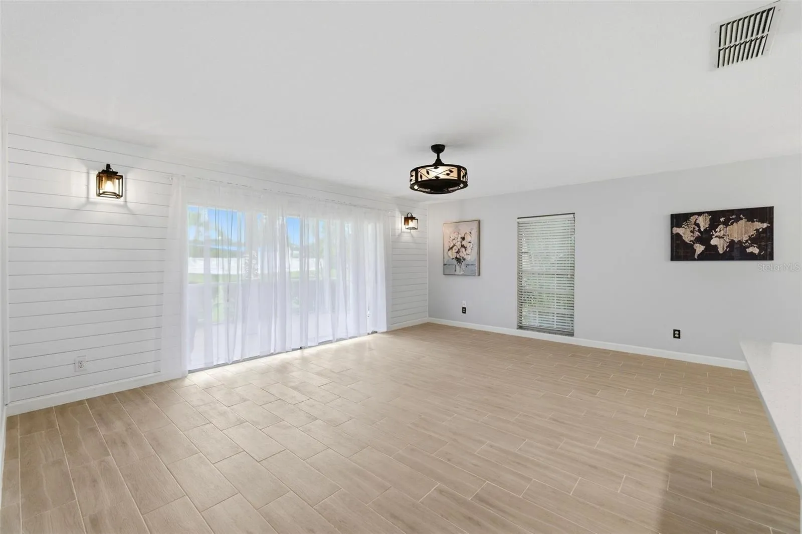 Full patio doors off the great room open onto spacious lanai