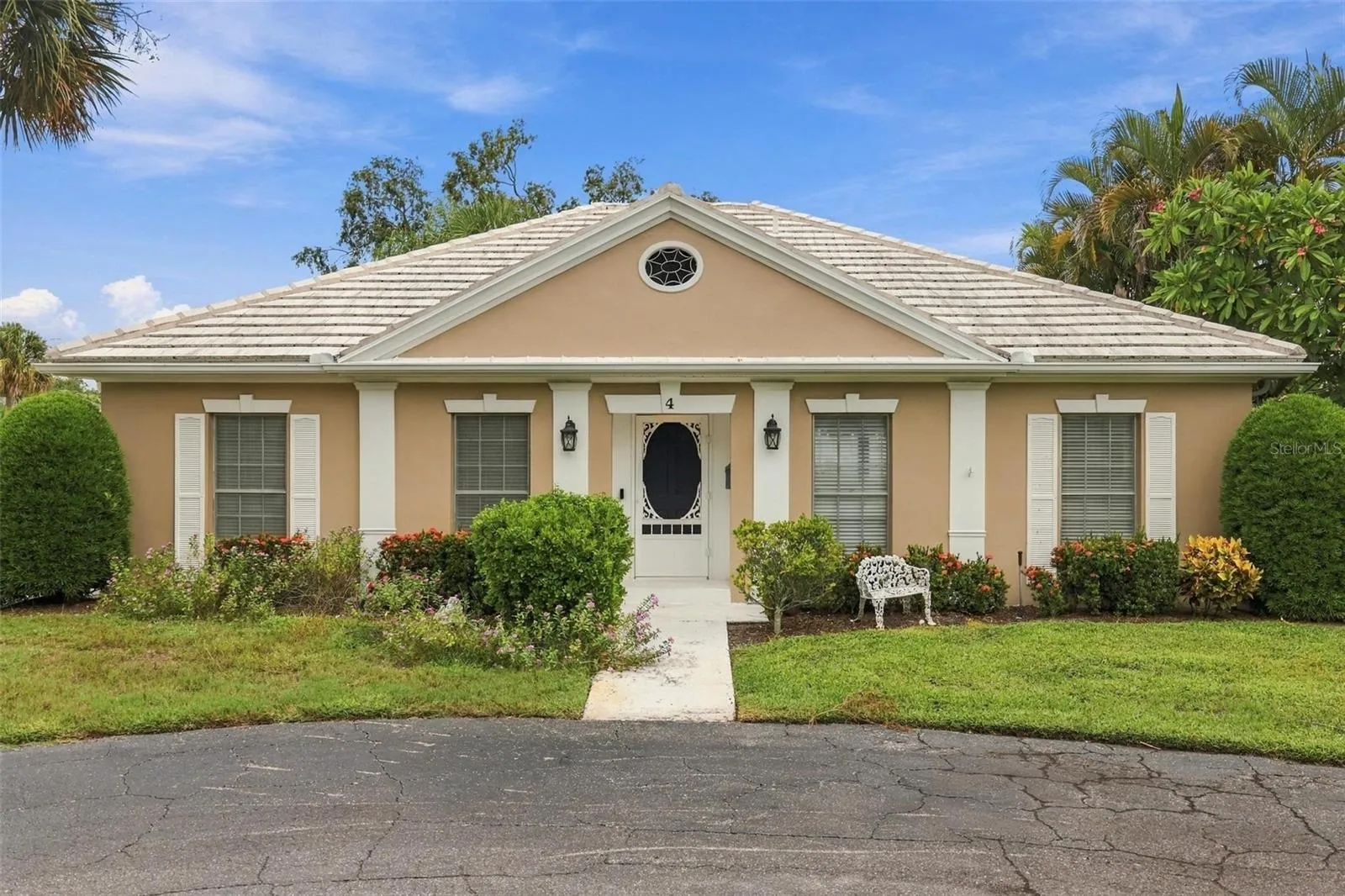 Welcome to 4 Antigua Circle!  A warm and charming villa located in one of Englewood's most prestigious neighbohoods.