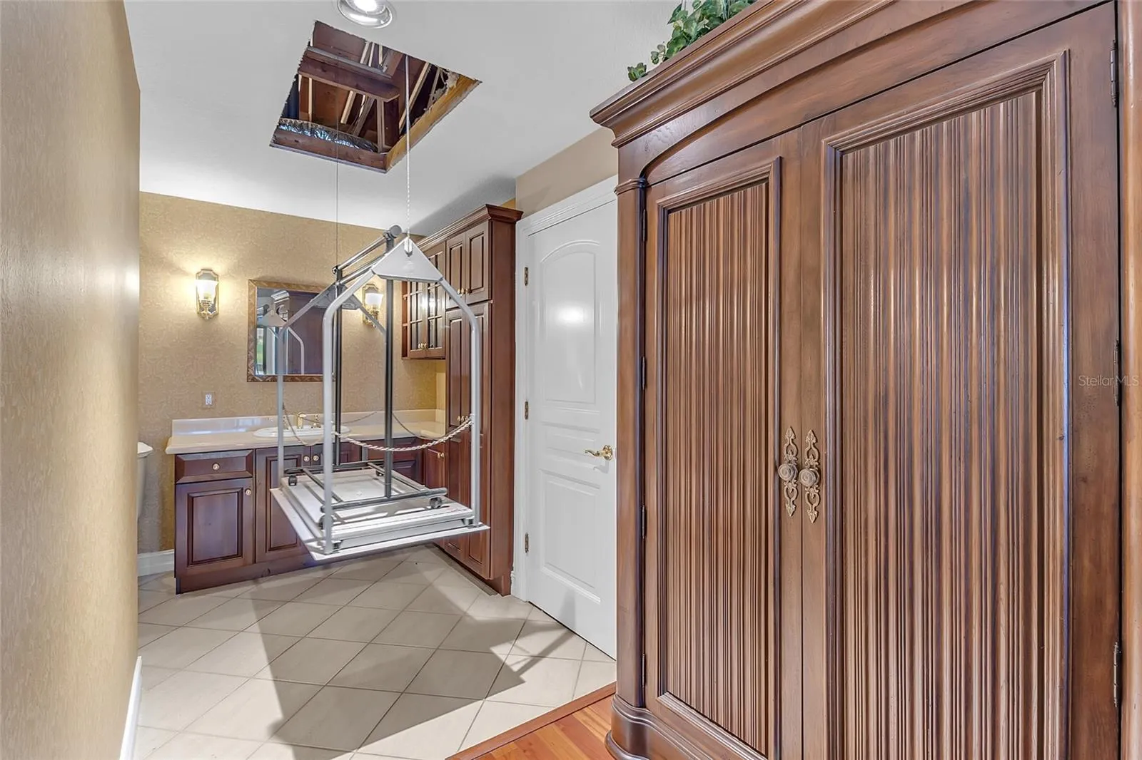 Convenient Lift Providing Access to Additional Attic Storage and Closet Space