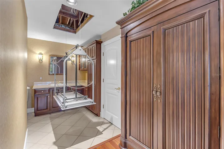 Convenient Lift Providing Access to Additional Attic Storage and Closet Space
