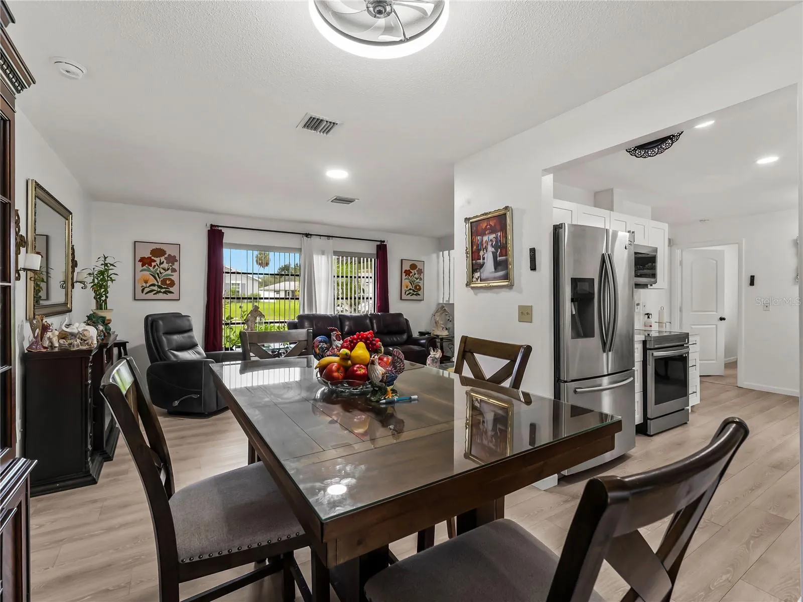 DiningRoom_20307SilentAve_PortCharlotte_OpenConcept_Wide.jpg