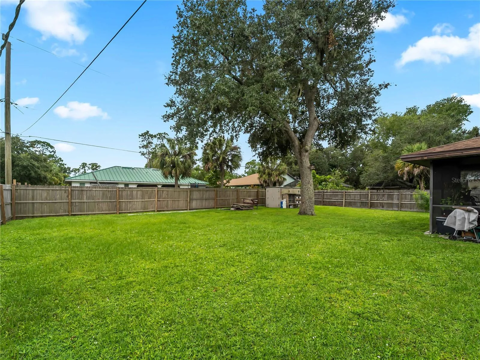 Backyard_20307SilentAve_PortCharlotte_PrivacyFence_Wide.jpg