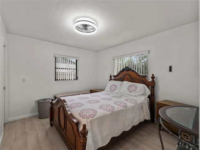 GuestBedroom_20307SilentAve_PortCharlotte_NaturalLight_Wide.jpg