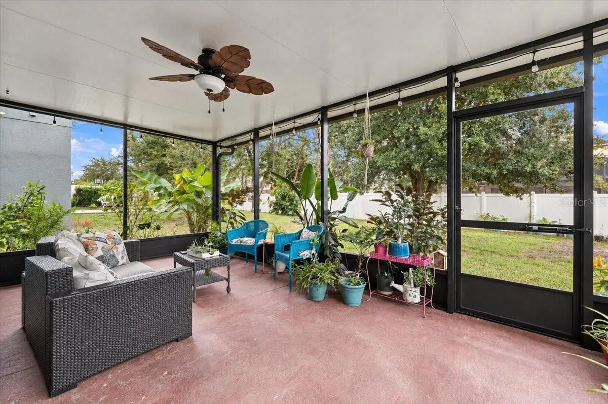 Screened in lanai with outdoor ceiling fan