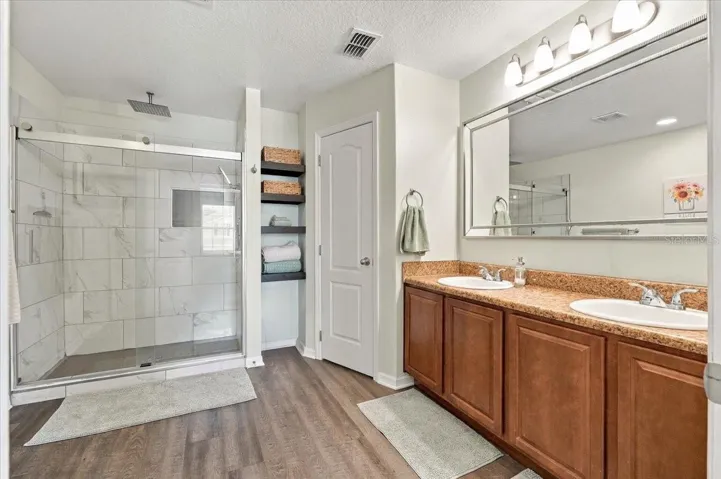 Master bathroom with shower &amp; dual vanity
