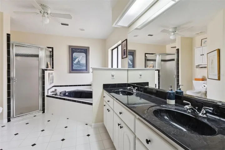 PRIMARY EN SUITE has DUAL SINKS, SOAKER TUB &amp; WALK-IN SHOWER.