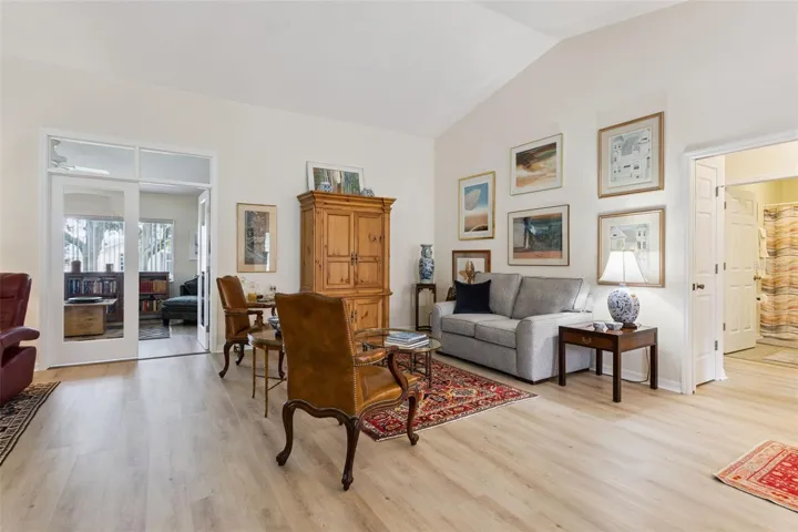LIVING ROOM looking toward office (through French doors)