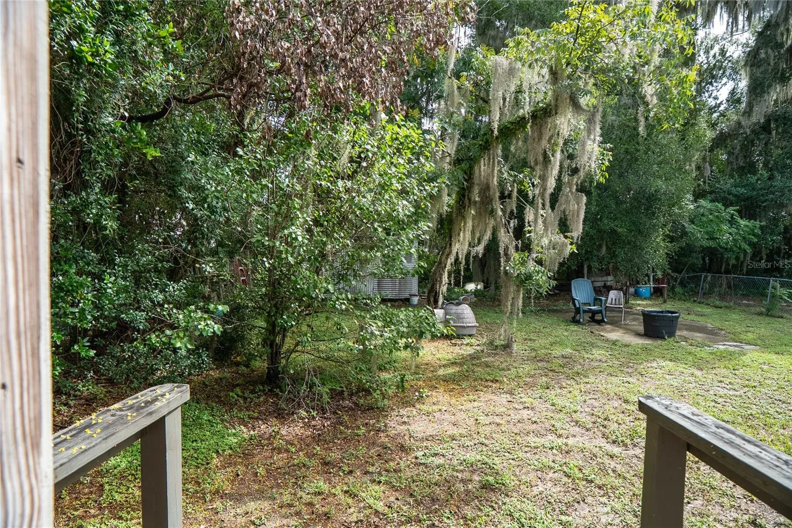 Backyard with ample outdoor space at 311 S Thompson Avenue, DeLand, FL 32720, situated on a 0.17-acre lot.