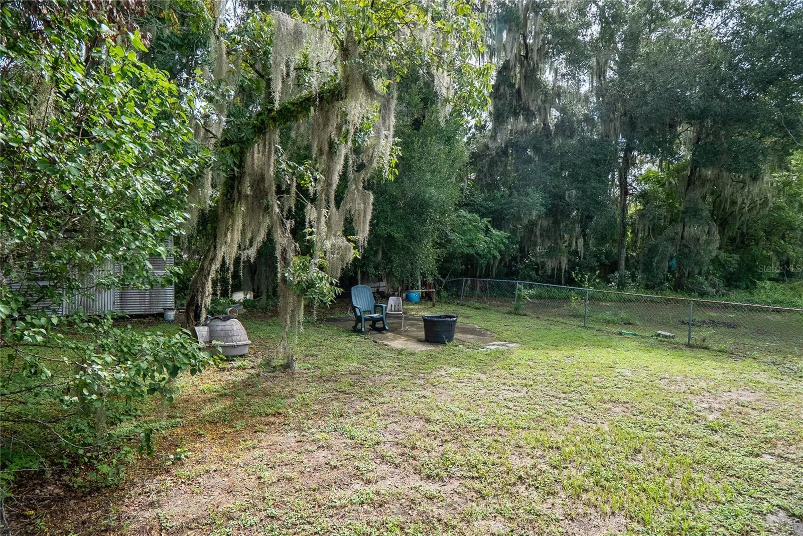 Backyard with ample outdoor space at 311 S Thompson Avenue, DeLand, FL 32720, situated on a 0.17-acre lot.