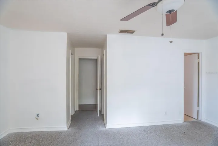 Dual Closets and Ensuite bathroom with shower in primary bedroom