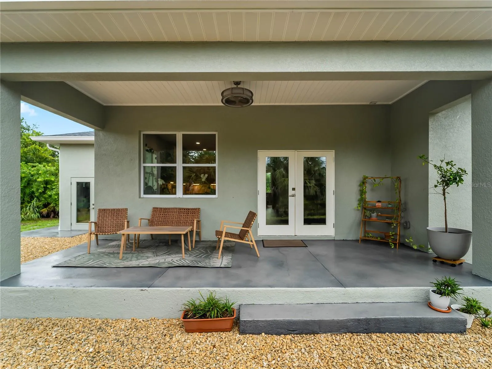 CoveredPatio_8163WalbertSt_PortCharlotte_OutdoorLiving_Wide.jpg
