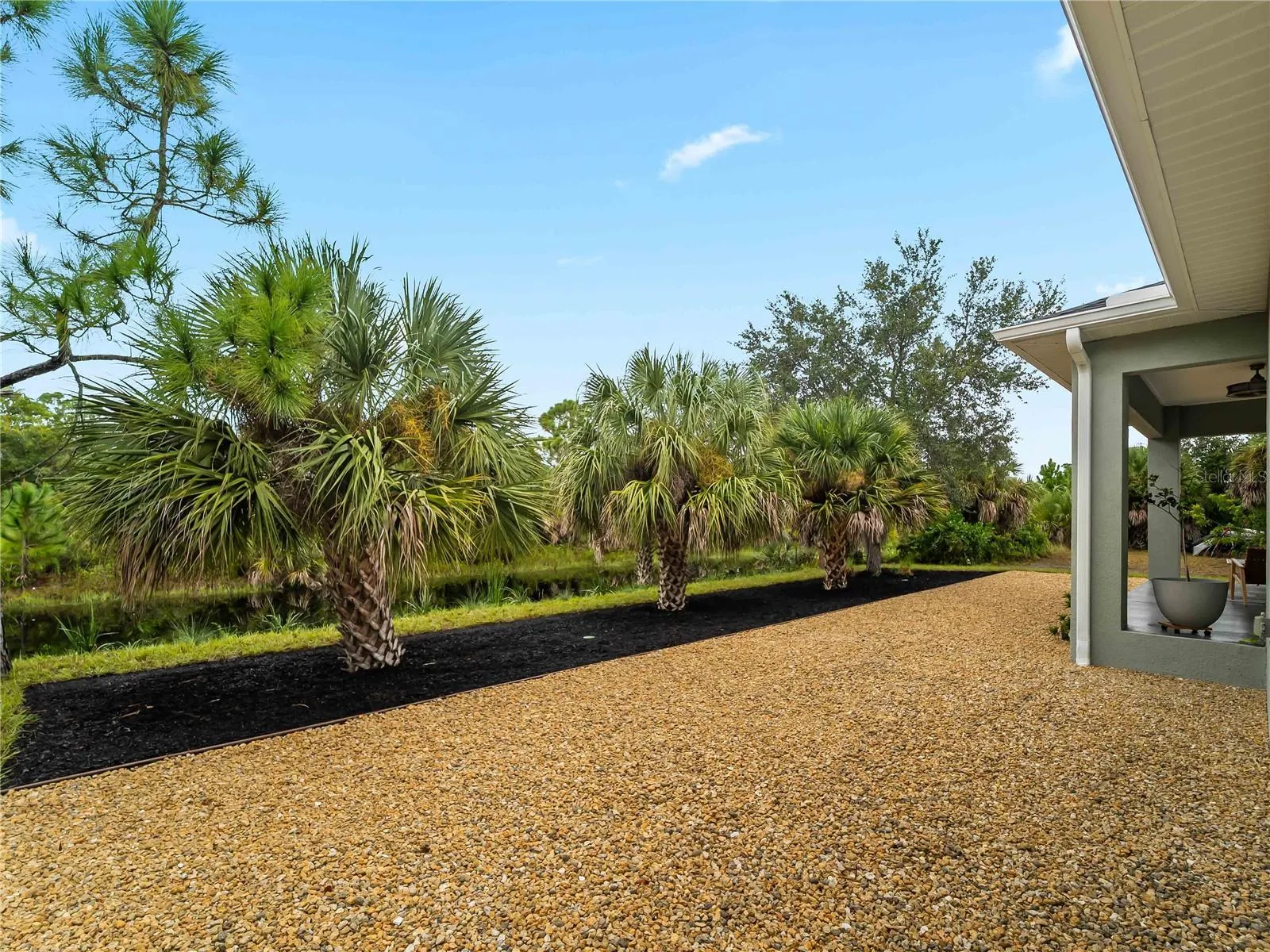 Backyard_8163WalbertSt_PortCharlotte_TropicalLandscaping_Wide.jpg