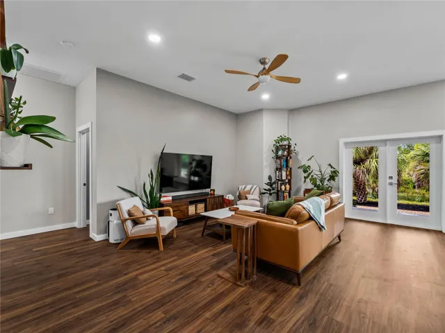 GreatRoom_8163WalbertSt_PortCharlotte_FrenchDoors_Corner.jpg