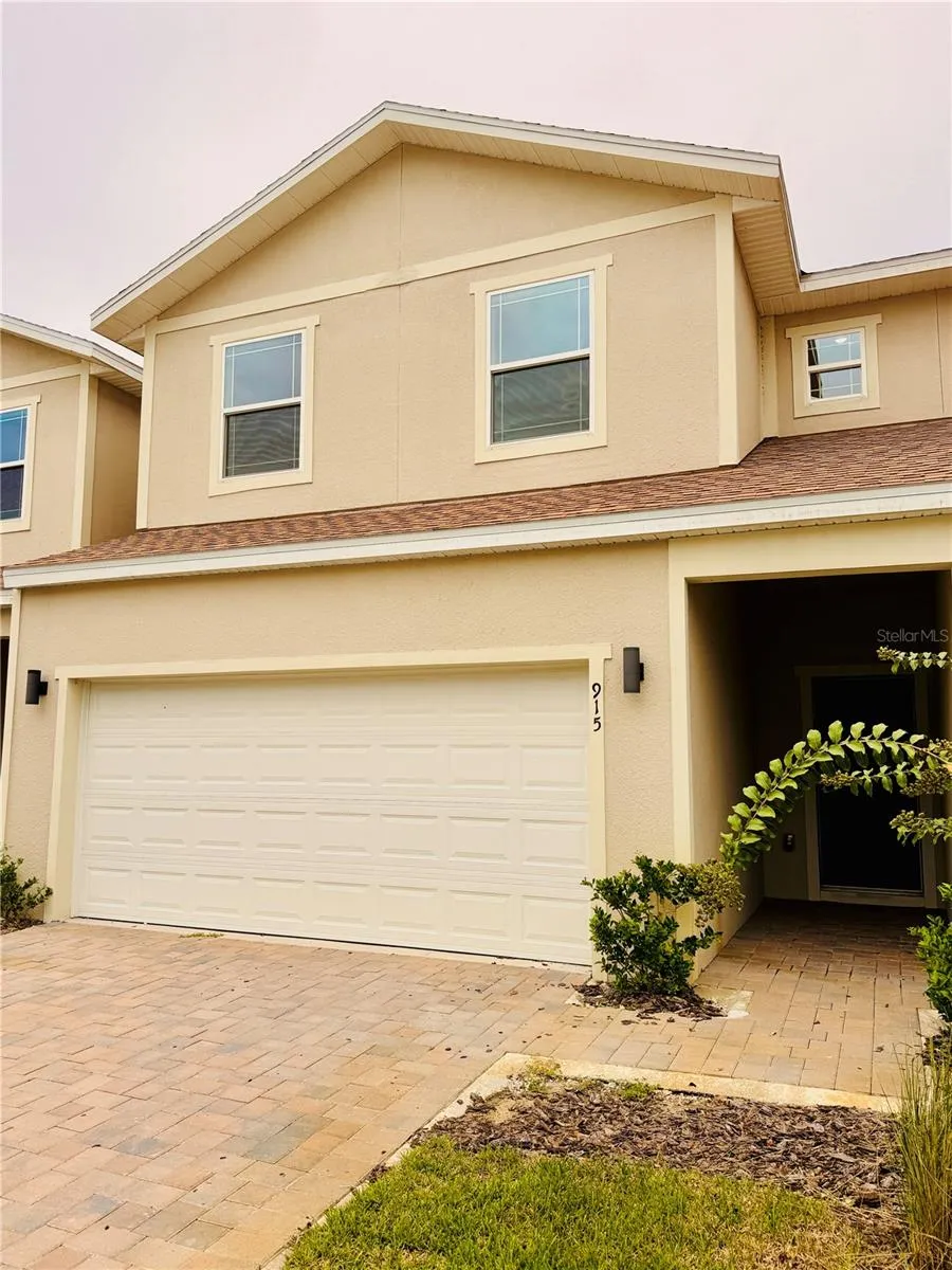 Front - two car garage and driveway