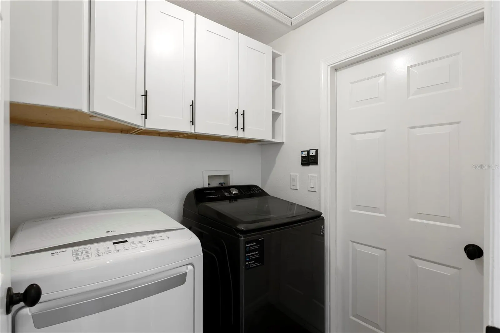 Dedicated laundry room conveniently located off the kitchen and garage.
