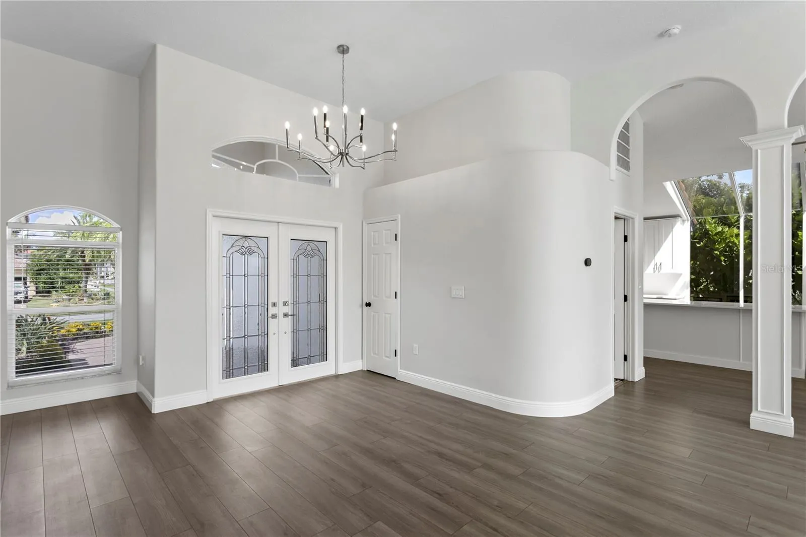 You'll find abundant natural light, high ceilings and elegant architectural details