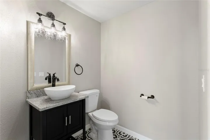 Beautifully appointed powder room with elevated finishes