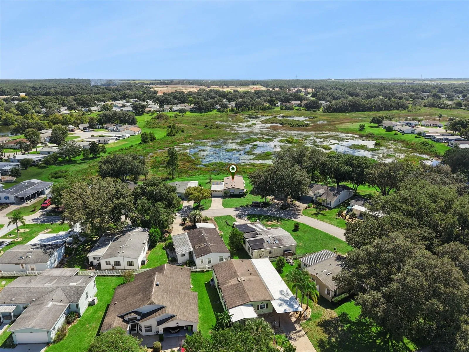 Aerial view of the neighborhood with the home marked