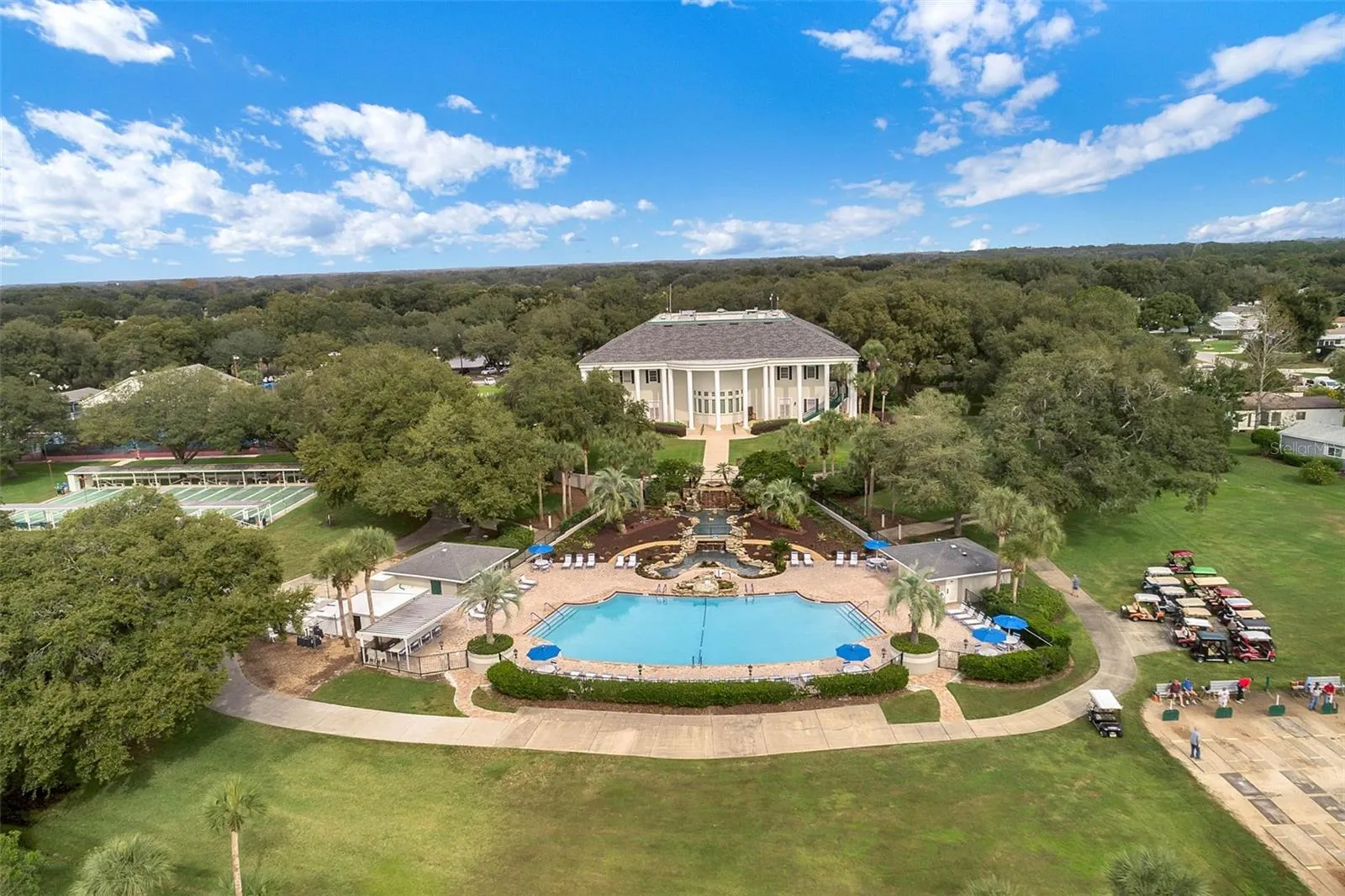 Community amenity: aerial view of the clubhouse, pool and grounds