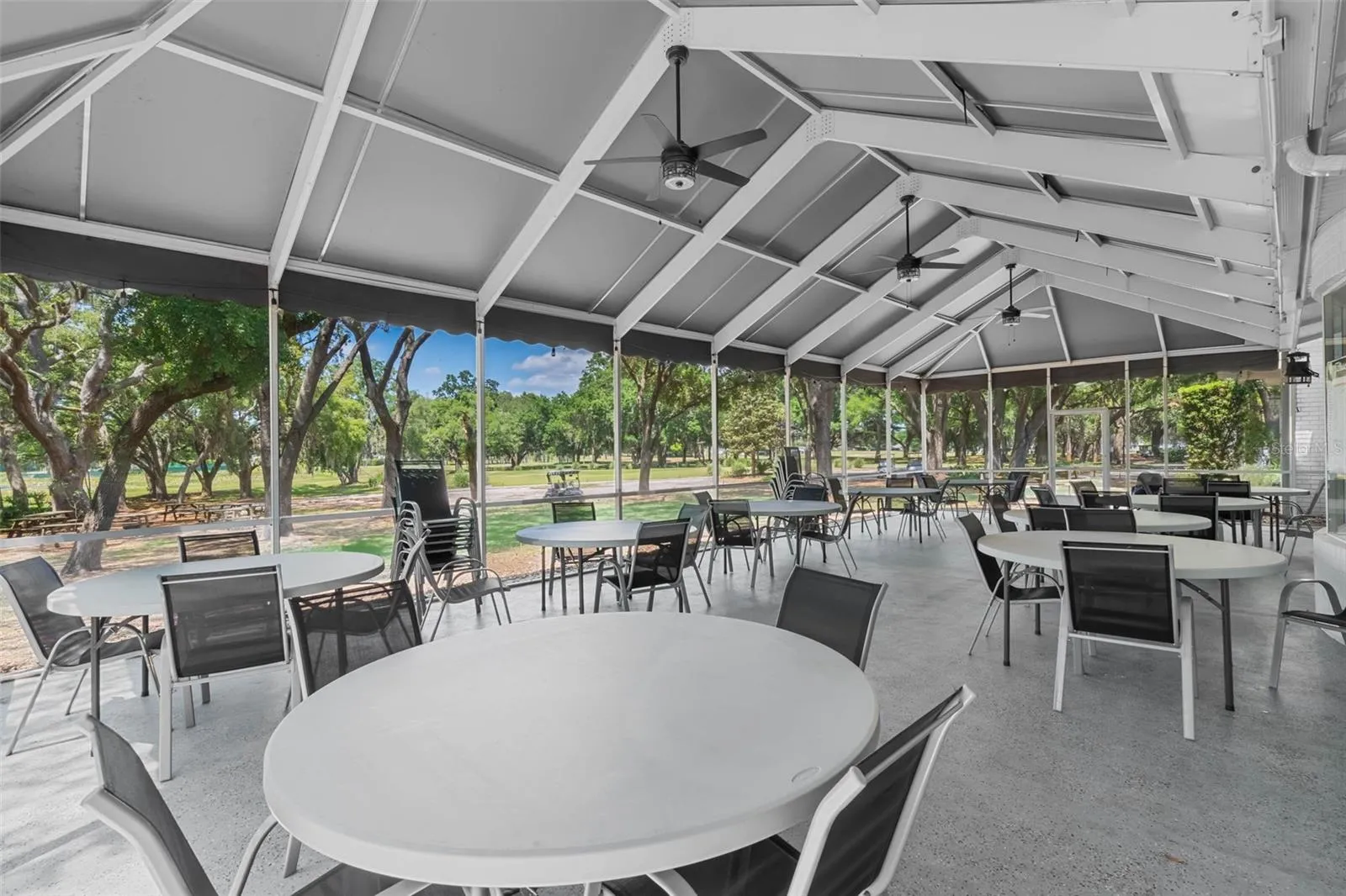 Community amenity: screened pavilion with tables and ceiling fans