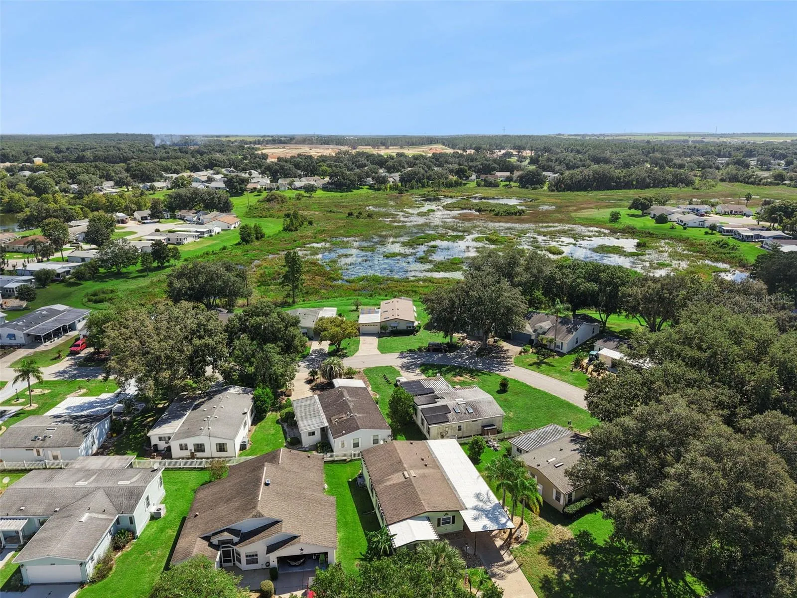 Aerial view of the neighborhood and marsh