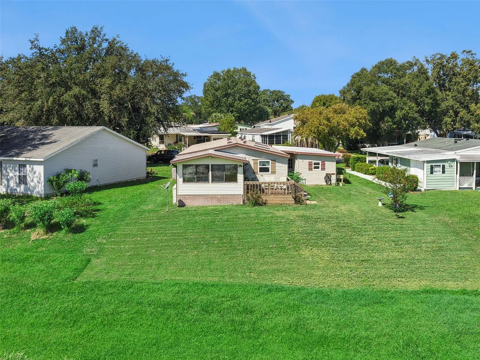 Aerial view of the rear of the home and backyard