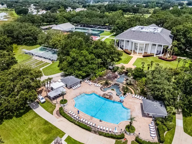Community amenity: aerial view of the clubhouse, pool and courts