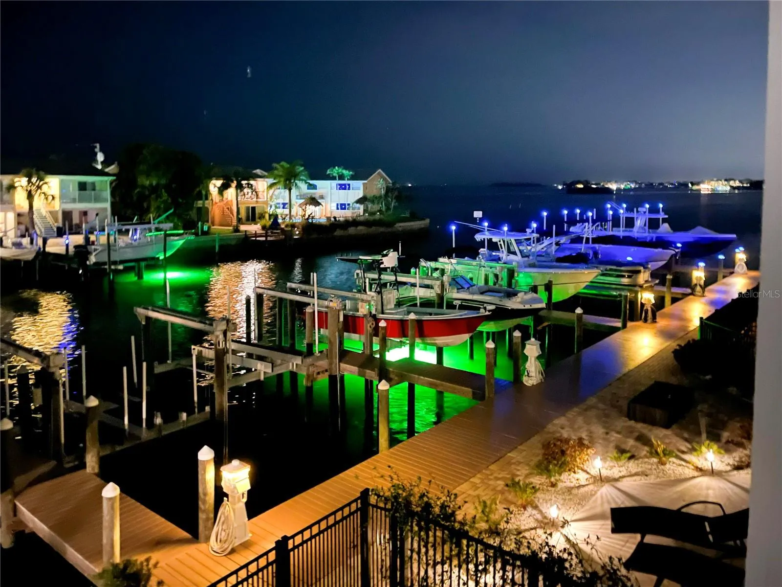 Night view of water and dock from 602 sea Court