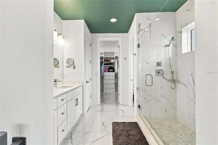 master bath with walk-in closet