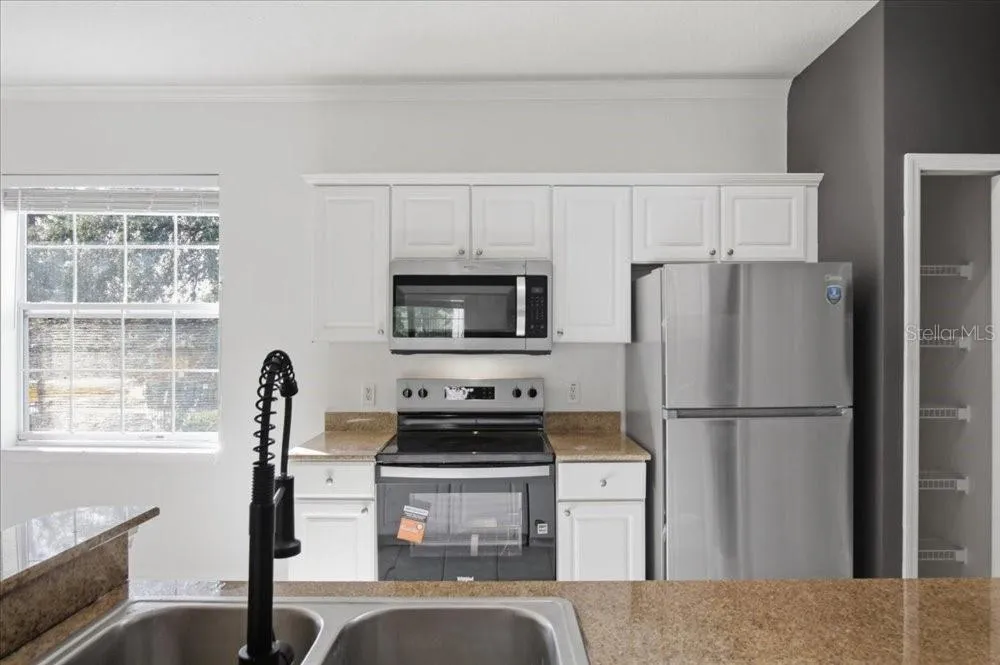 Kitchen (cabinets and appliances)