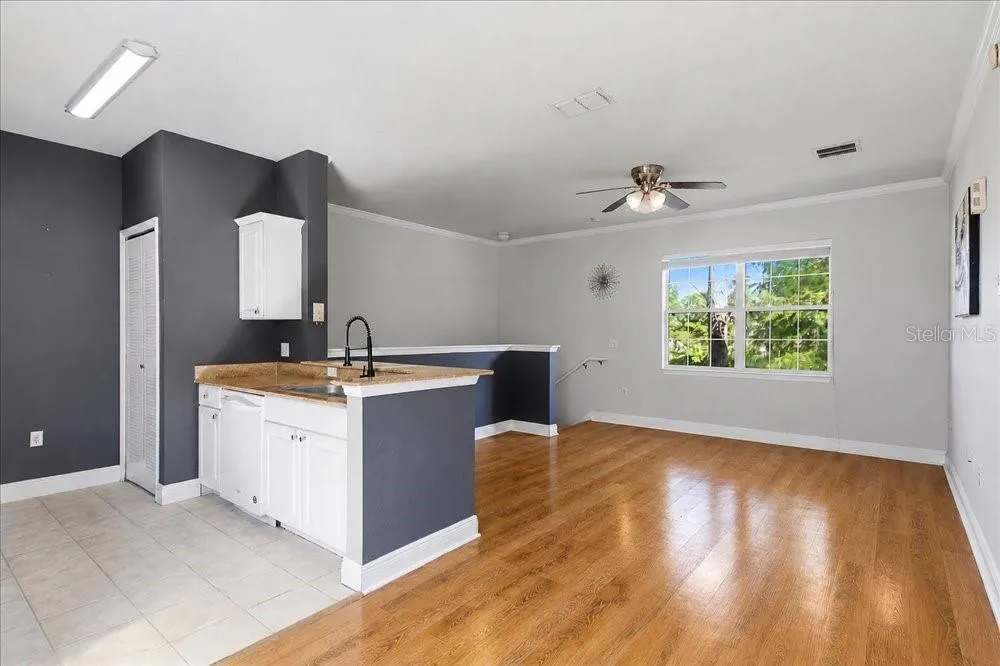 Wide view of the living area and kitchen